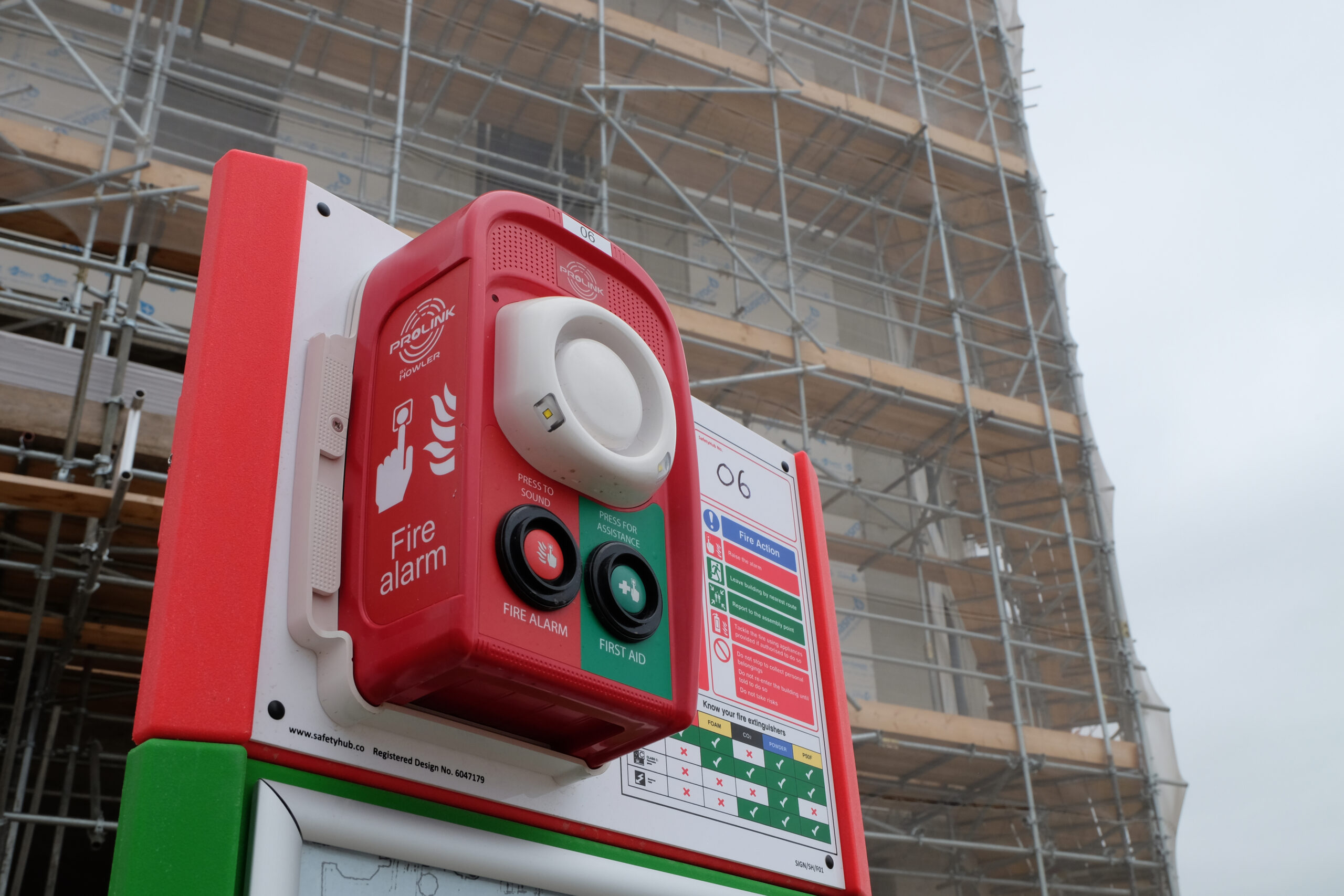close up of howler prolink fire alarm on construction site
